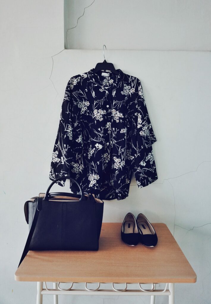 a black shirt and accessories