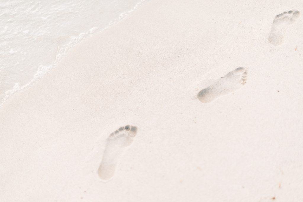 footprints on a sandy beach