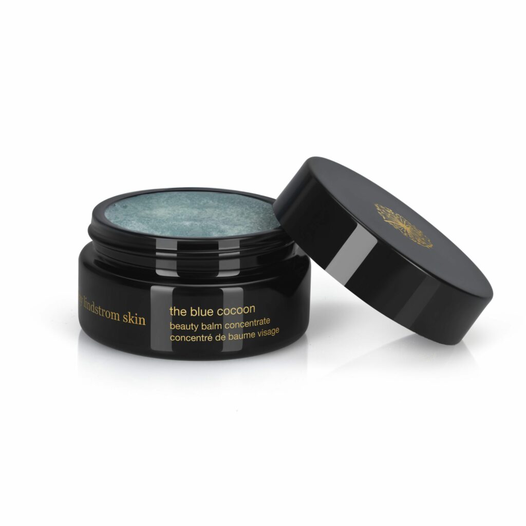 picture of a small black container of May Lindstrom the blue cocoon